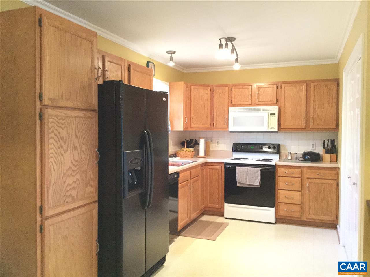 14 East Point Road Palmyra, VA 22963 - Photo 4 of 19 a kitchen with stainless steel appliances granite countertop a refrigerator and a stove