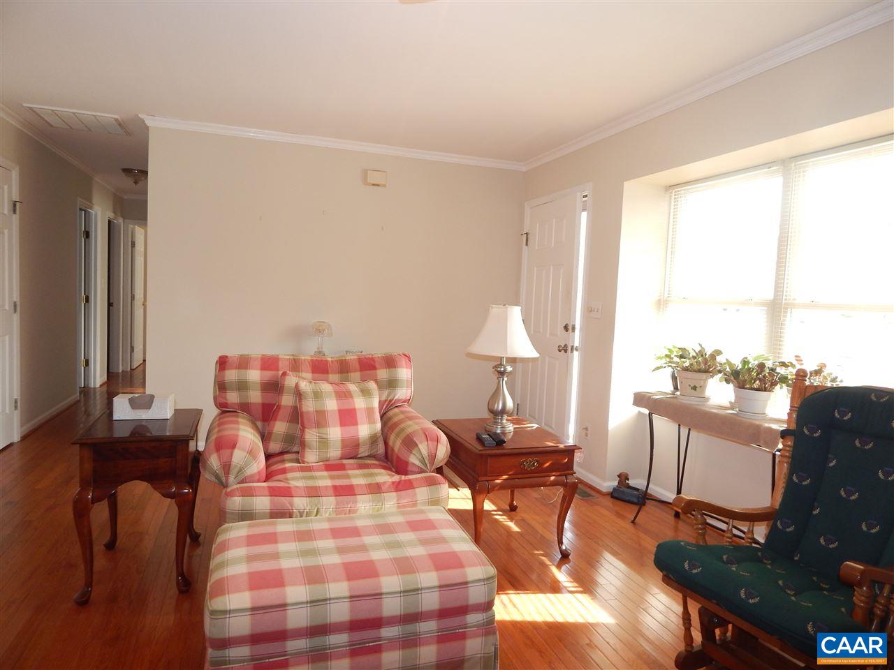 14 East Point Road Palmyra, VA 22963 - Photo 7 of 19 a bedroom with a bed and wooden floor