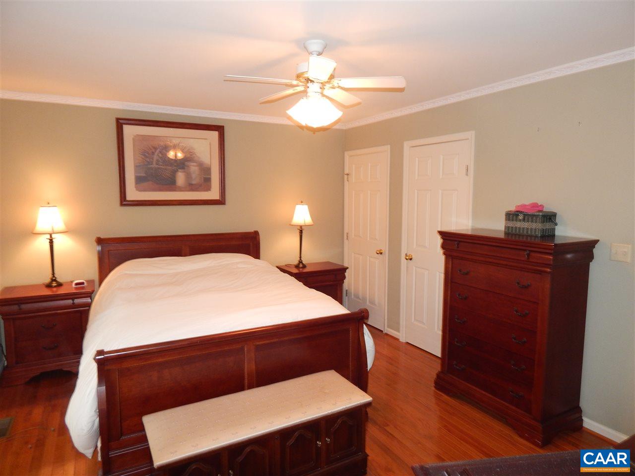 14 East Point Road Palmyra, VA 22963 - Photo 10 of 19 a bedroom with a bed and a dresser