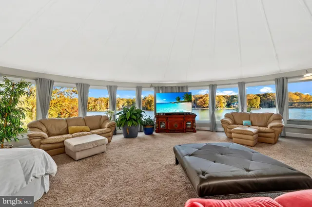 a bedroom with furniture and window