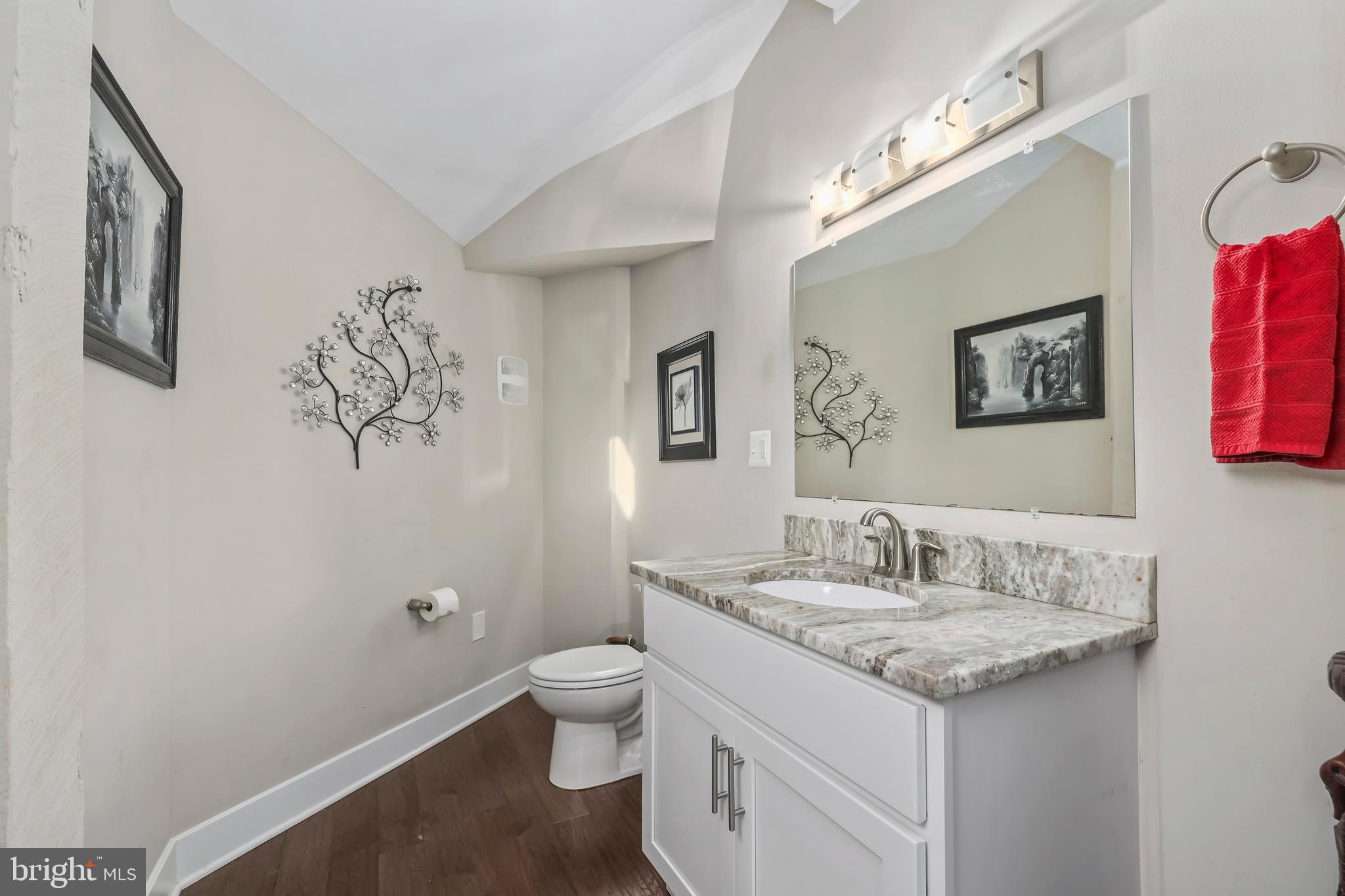 20 Greenvale Court Ruther Glen, VA 22546 - Photo 24 of 65 a bathroom with a granite countertop sink and a mirror