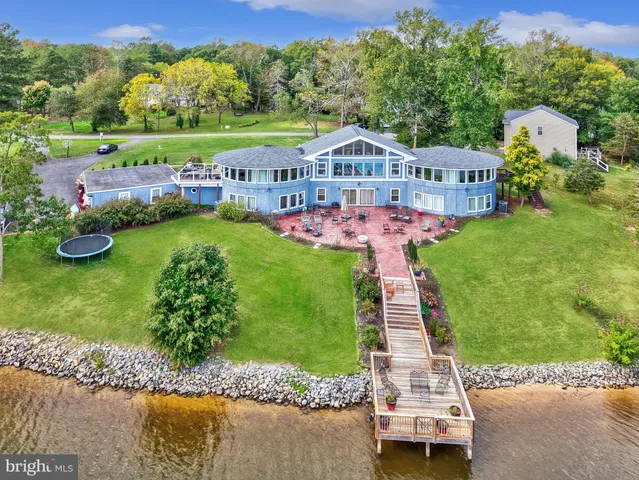 a view of swimming pool with outdoor seating