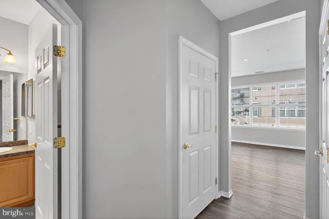 a view of a bathtub in a hallway