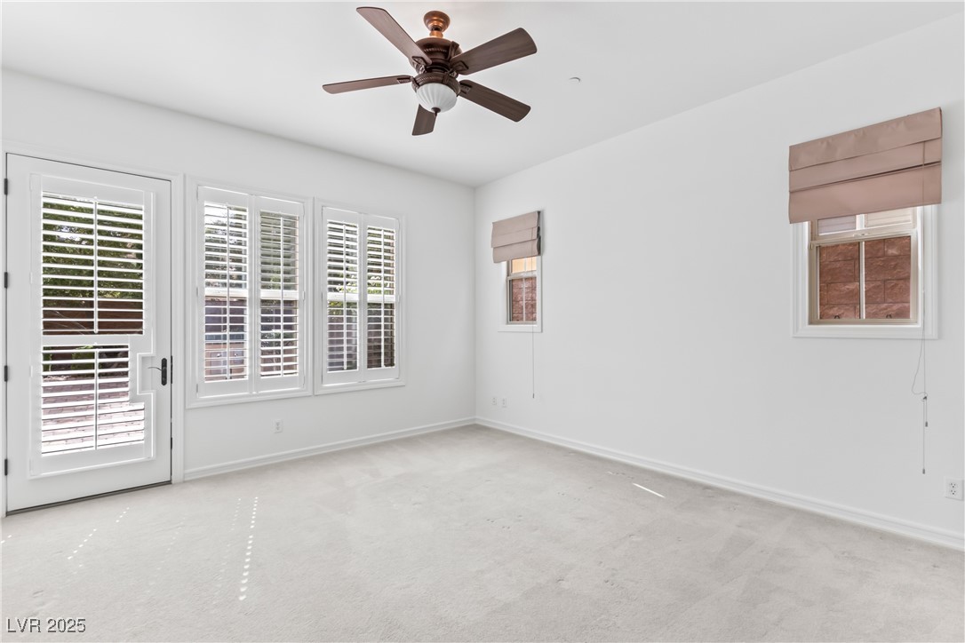58 Contrada Fiore Drive Henderson, NV 89011 - Photo 20 of 56 Unfurnished room with carpet and ceiling fan