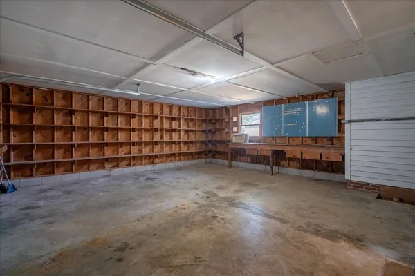 a view of an empty room with a garage