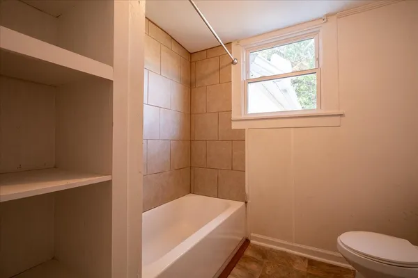 a bathroom with a sink a toilet