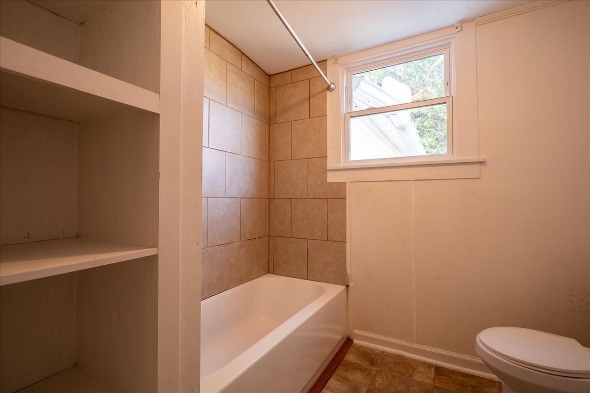 202 Vine Street Loretto, TN 38469 - Photo 23 of 42 a bathroom with a sink a toilet