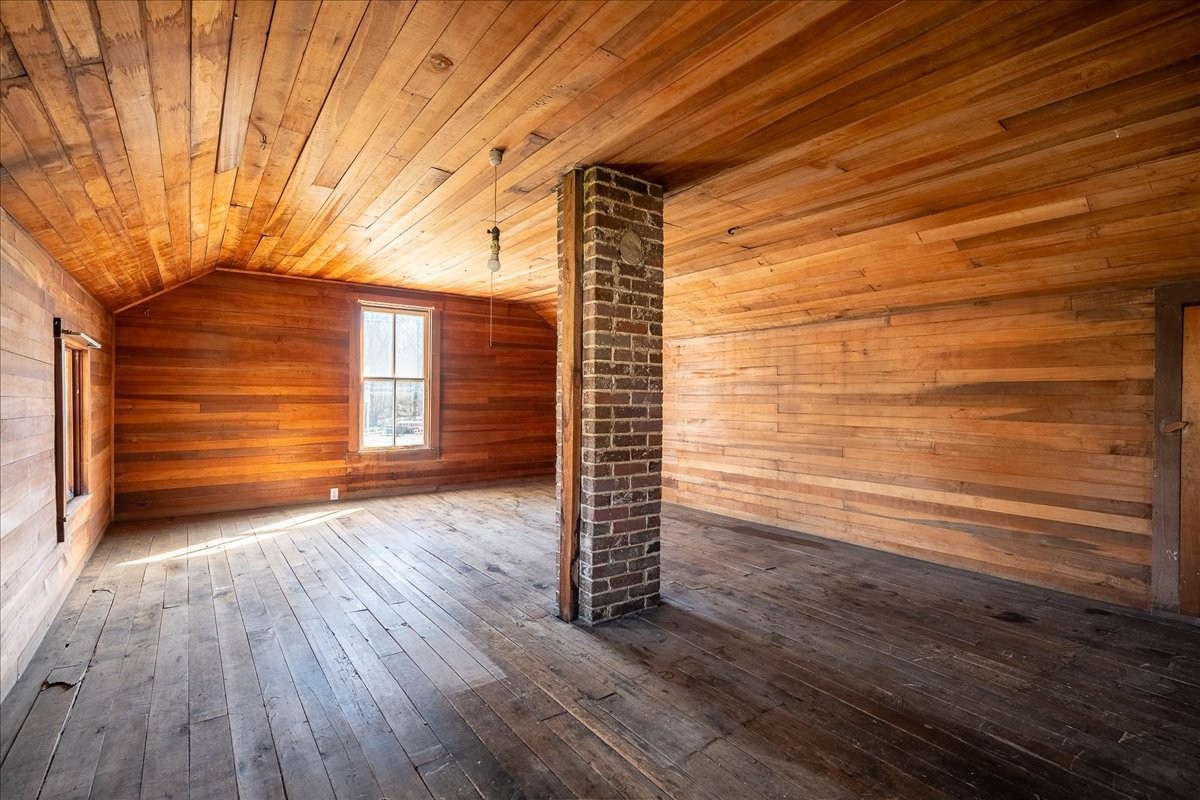 202 Vine Street Loretto, TN 38469 - Photo 28 of 42 a view of empty room with wooden floor