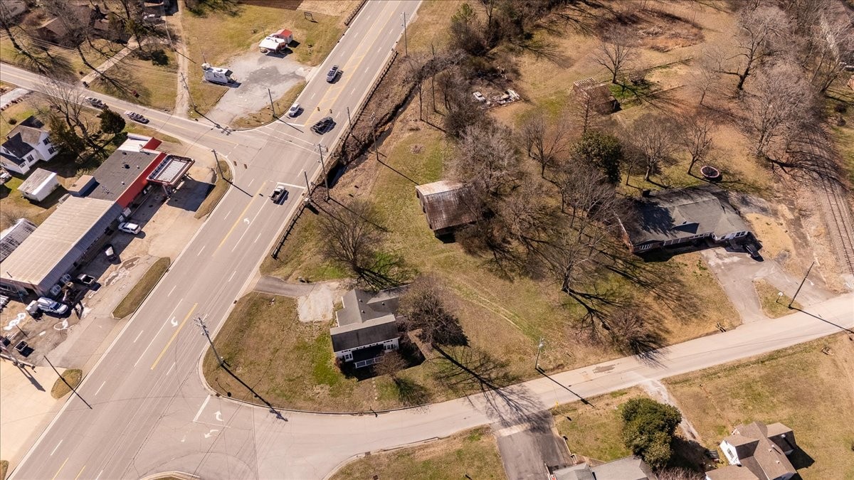 202 Vine Street Loretto, TN 38469 - Photo 30 of 42 an aerial view of a house with a yard