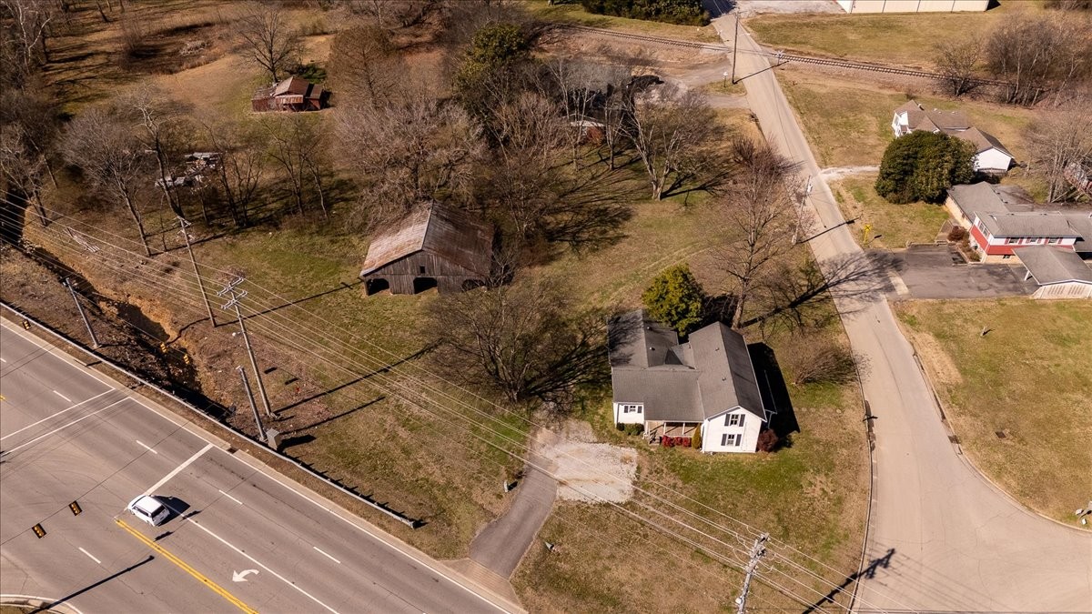 202 Vine Street Loretto, TN 38469 - Photo 39 of 42 an aerial view of a house with a yard