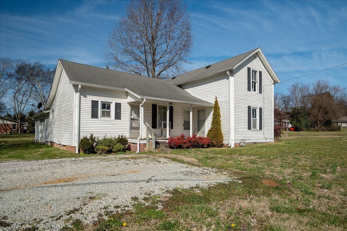 202 Vine Street Loretto, TN 38469 - Photo 6 of 42 a view of a house with a yard
