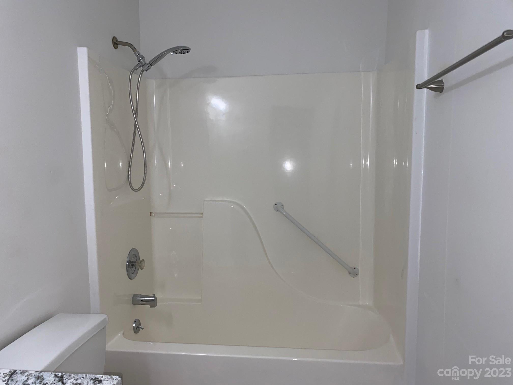 671 Pine Ridge Road Chester, SC 29706 - Photo 9 of 21 a bathroom with a bathtub and a shower