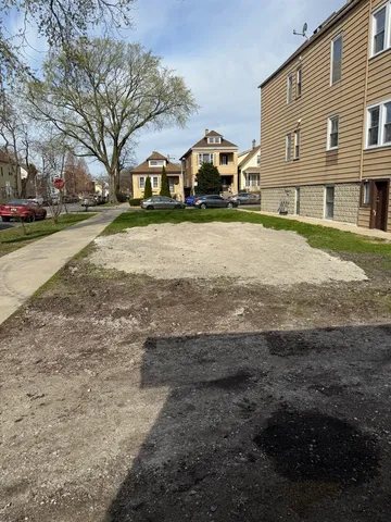 a view of street with houses