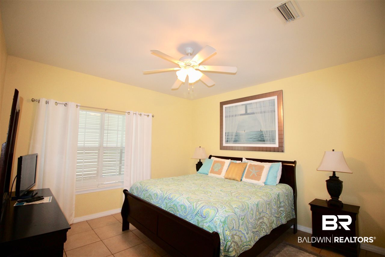 4374 Lindsey Lane, Unit 4374A Orange Beach, AL 36561 - Photo 11 of 20 King Sized Bed and nice sized TV