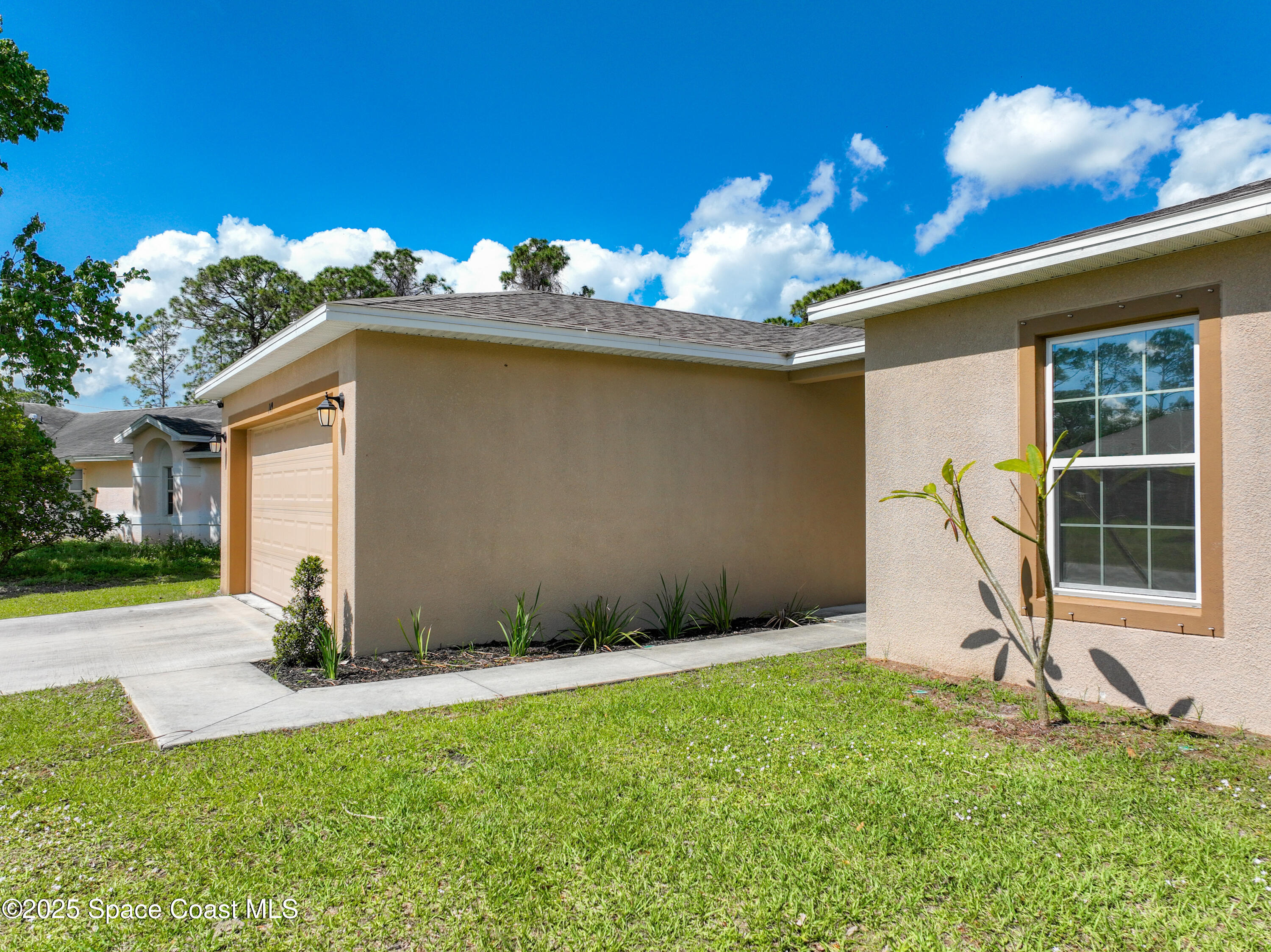 149 Gallopo Road Southwest Palm Bay, FL 32908 - Photo 3 of 36 149 Gallopo Road SW-7