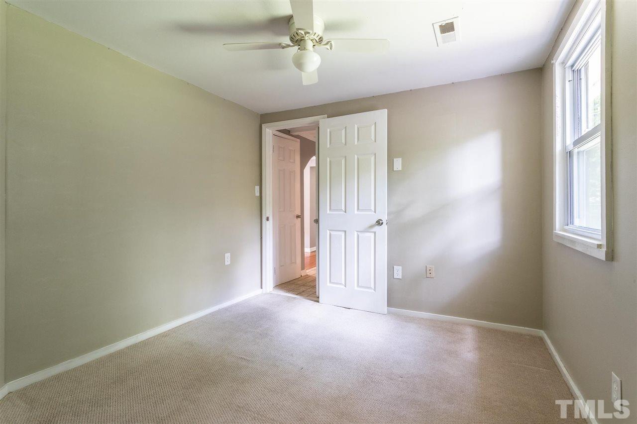 1503 Wiljohn Road Garner, NC 27529 - Photo 19 of 26 an empty room with windows and closet