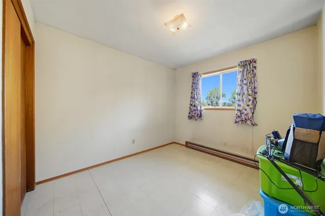 a room with furniture and a window