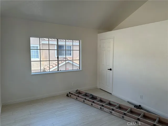 a bathroom with a sink vanity and mirror
