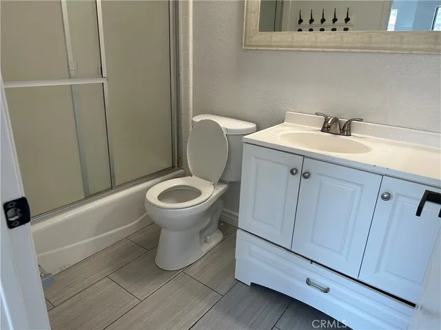 a view of a sink and cabinets