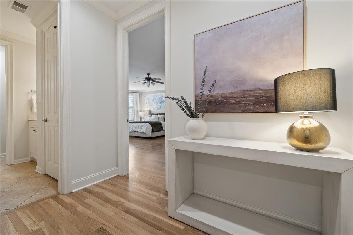 9455 Johnson Rd Extension Germantown, TN 38139 - Photo 17 of 40 Hallway featuring light wood finished floors and baseboards