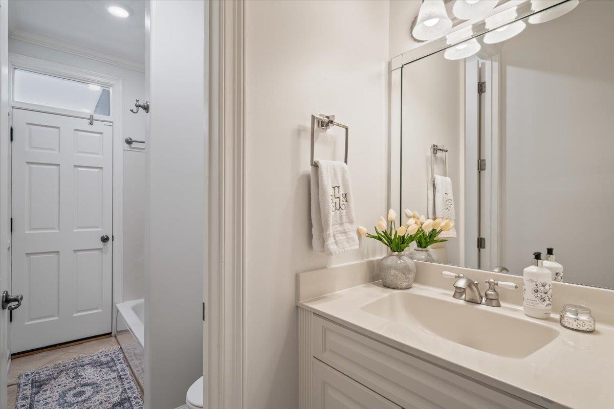 9455 Johnson Rd Extension Germantown, TN 38139 - Photo 24 of 40 Bathroom with vanity and ornamental molding