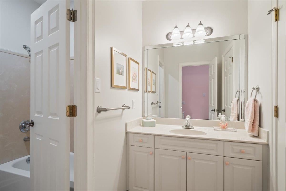 9455 Johnson Rd Extension Germantown, TN 38139 - Photo 26 of 40 Bathroom featuring vanity and shower / washtub combination