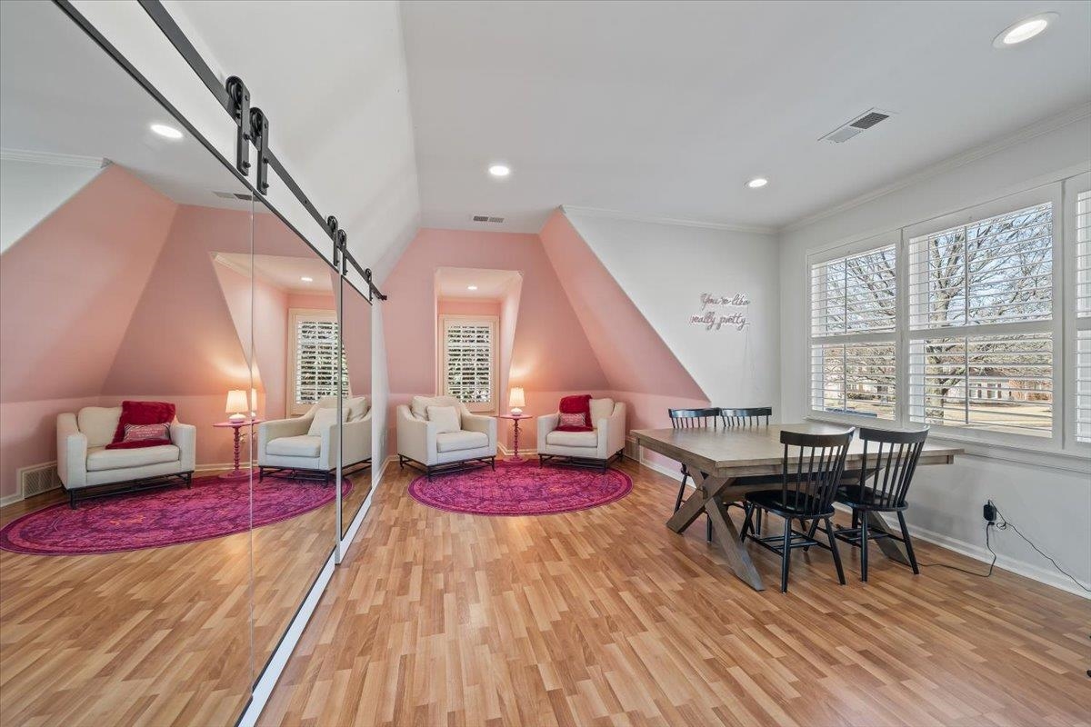 9455 Johnson Rd Extension Germantown, TN 38139 - Photo 31 of 40 Dining space with light wood-style flooring, recessed lighting, vaulted ceiling, and ornamental molding