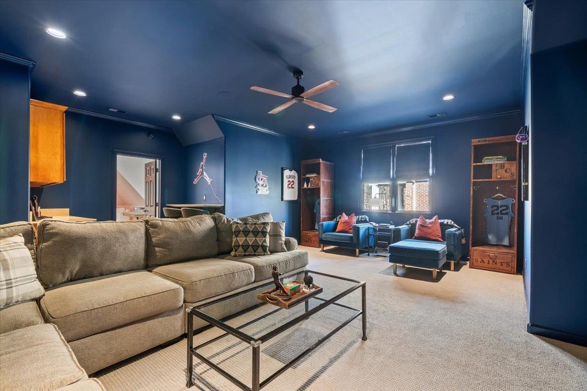 9455 Johnson Rd Extension Germantown, TN 38139 - Photo 34 of 40 Carpeted living room with crown molding, recessed lighting, and ceiling fan