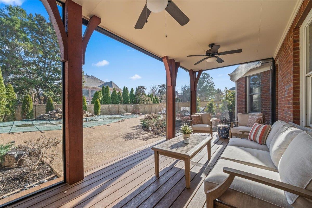 9455 Johnson Rd Extension Germantown, TN 38139 - Photo 35 of 40 Deck featuring a ceiling fan, an outdoor hangout area, and a patio