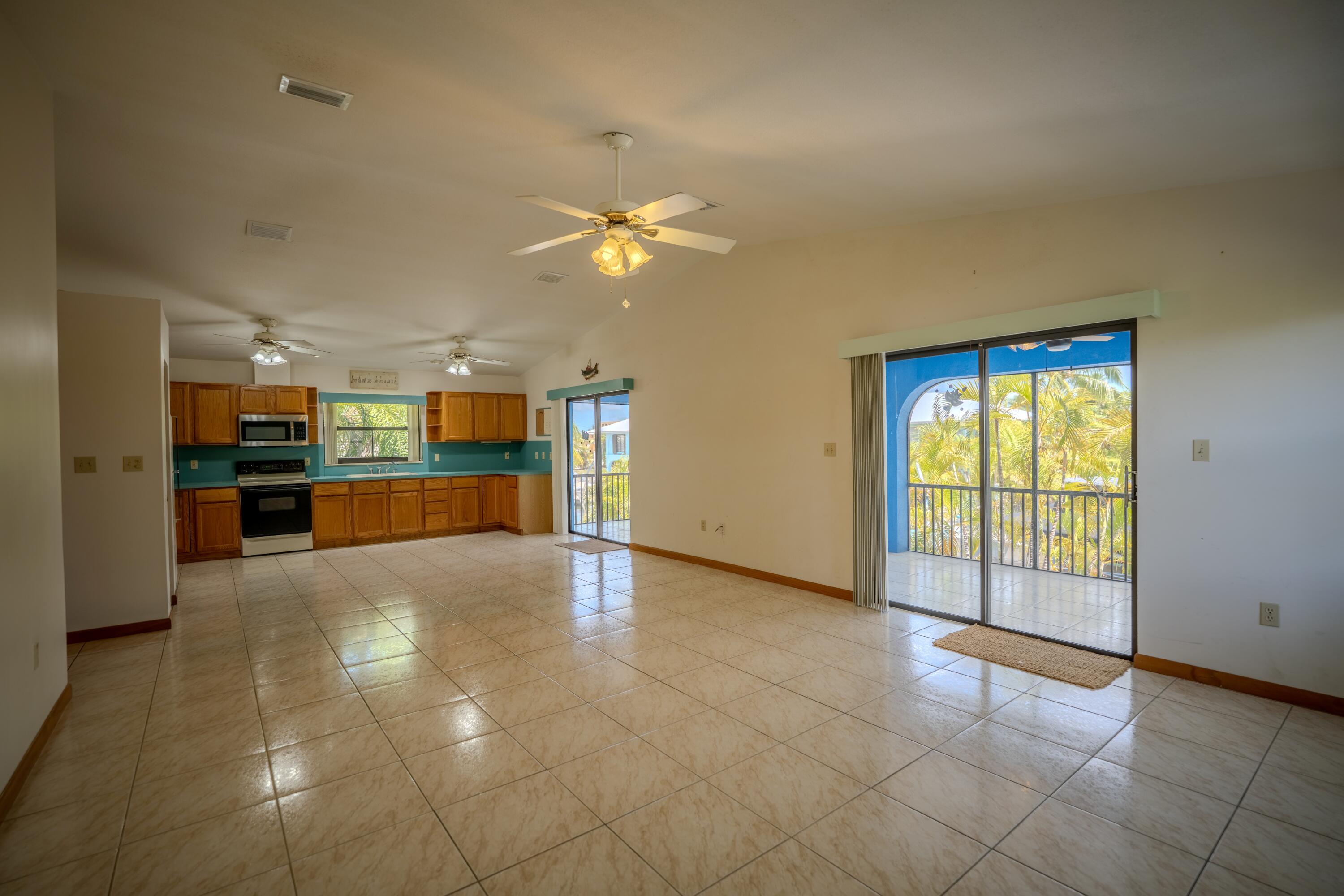 29487 Ranger Avenue Big Pine Key, FL 33043 - Photo 3 of 47 open living space with patio access