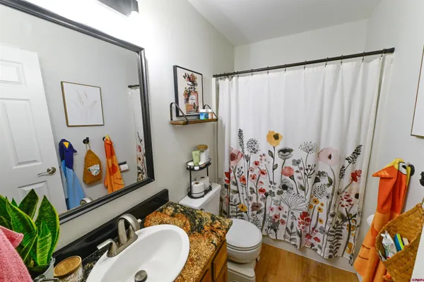 a bathroom with a toilet and sink