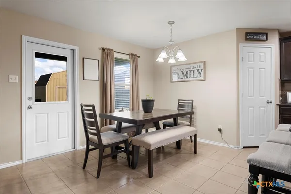 a view of a livingroom with furniture and window