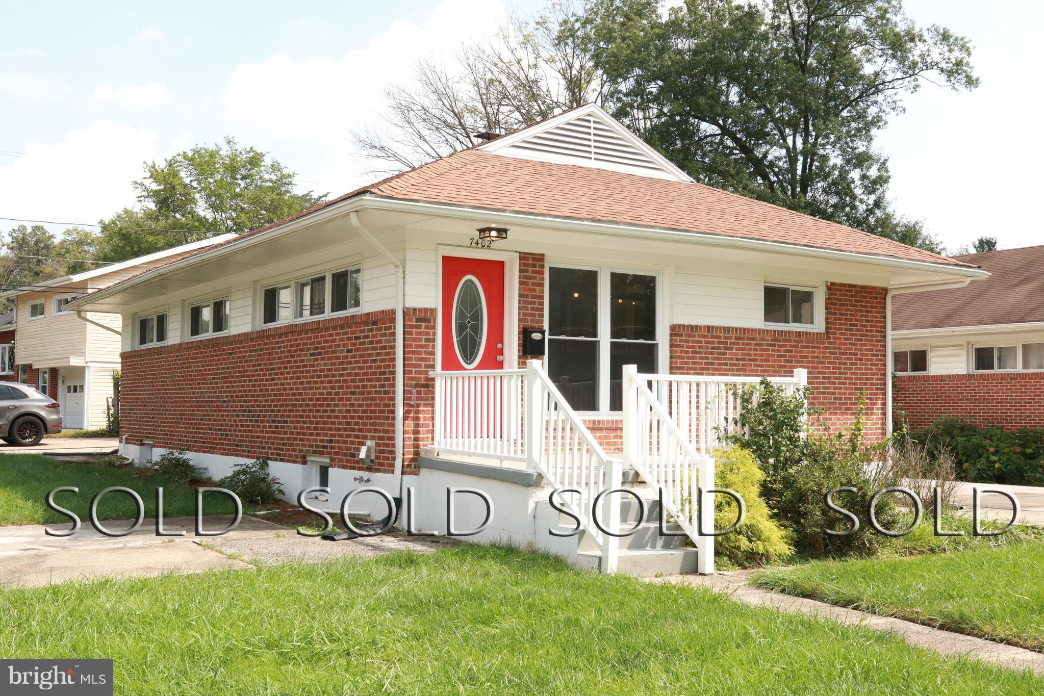 7402 Rockridge Road Baltimore, MD 21208 - Photo 1 of 30 a view of a house with backyard