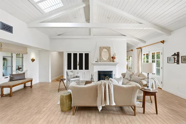 a view of a patio with a table and chairs