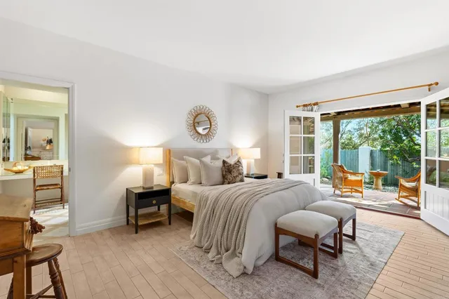 a bathroom with a tub sink and shower