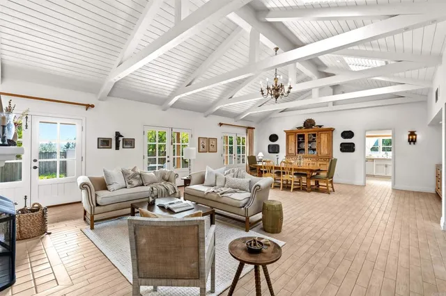 a kitchen with a stove a sink and a refrigerator