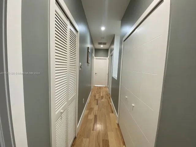 a living room with furniture and rug