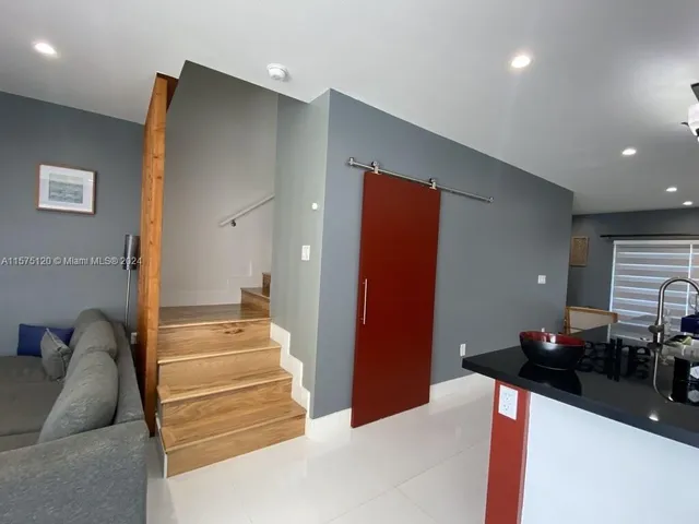 a view of entry way with wooden floor