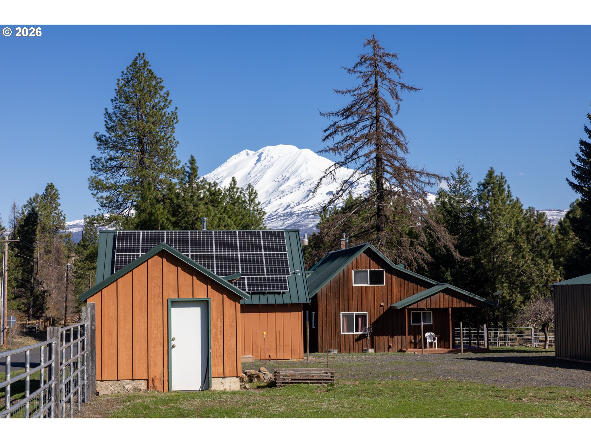 56 Jennings Road Trout Lake, WA 98650 - Photo 3 of 42 a front view of a house with a yard