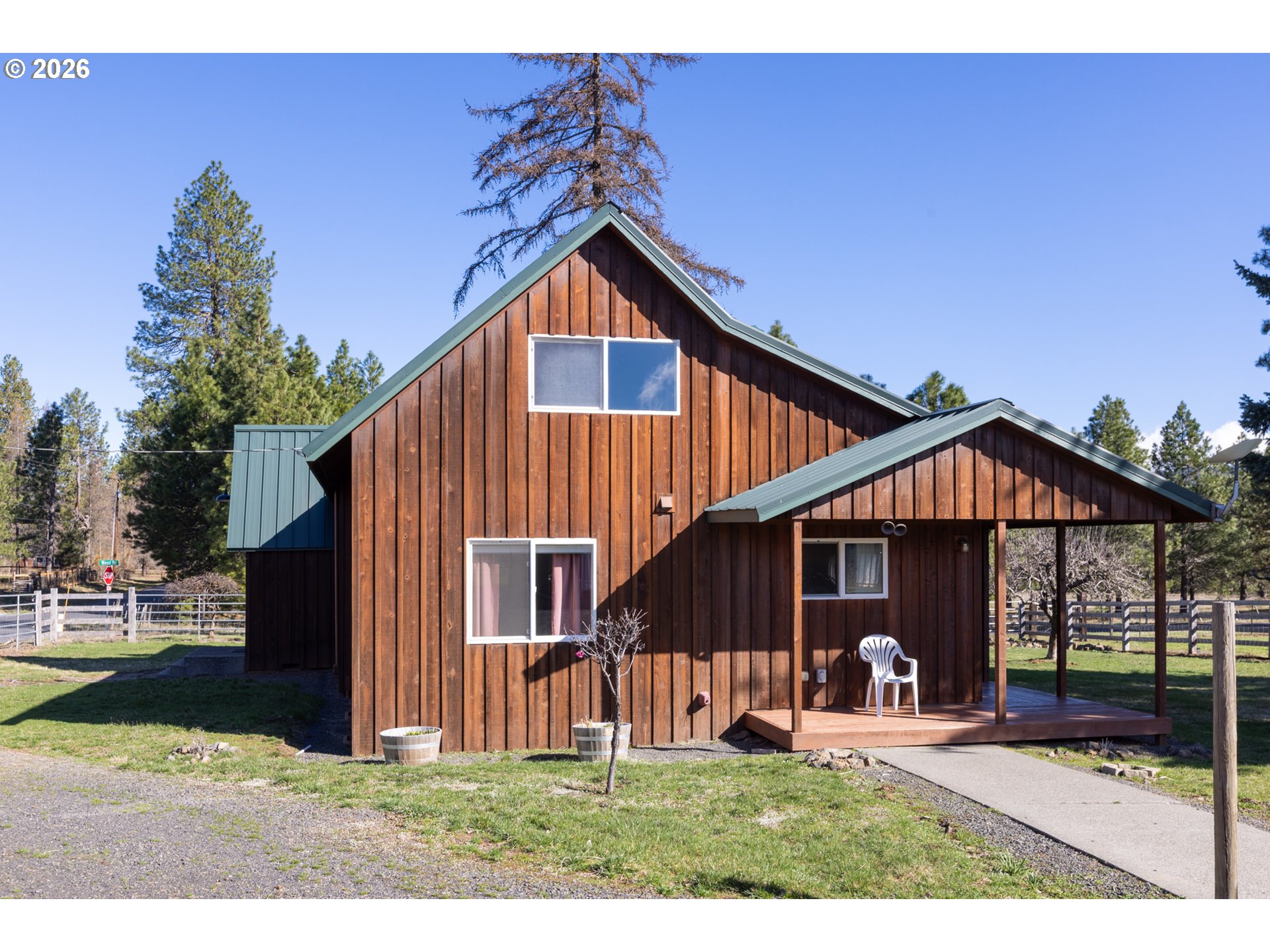 56 Jennings Road Trout Lake, WA 98650 - Photo 38 of 42 a front view of a house with garden