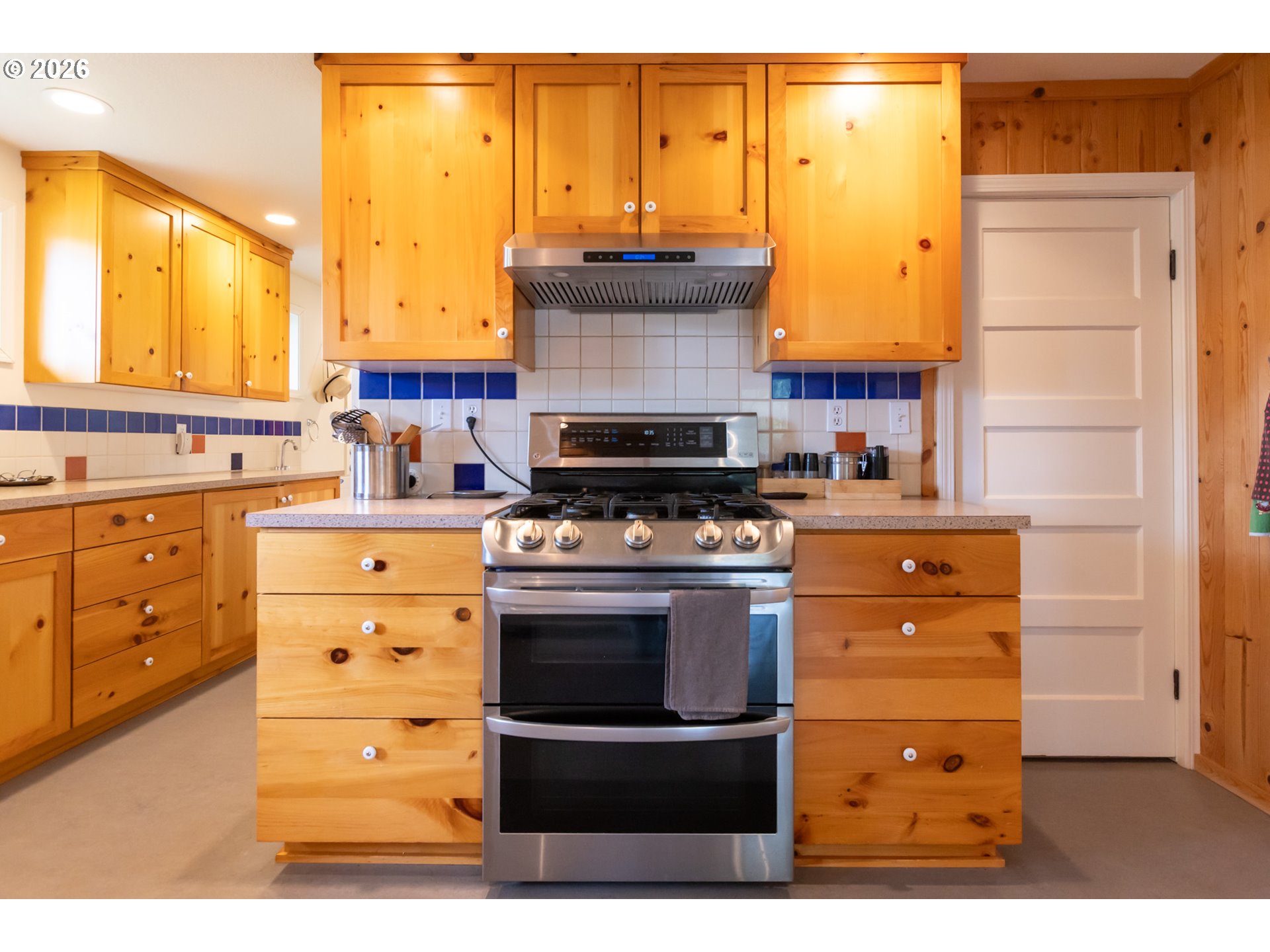 56 Jennings Road Trout Lake, WA 98650 - Photo 10 of 42 a kitchen with stainless steel appliances a stove and a refrigerator