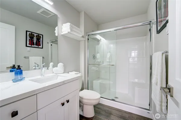 a bathroom with a shower and a shower curtain