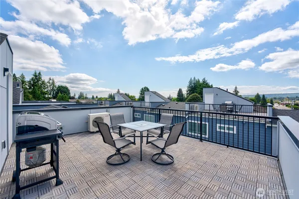 a front view of a building with a yard