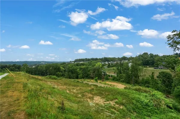 a view of a lake from a yard