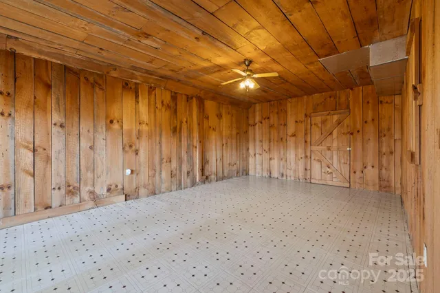 a view of a livingroom with wooden floor