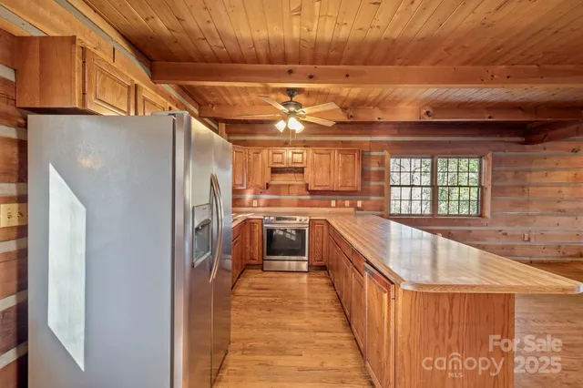 a view of a kitchen with a sink and dishwasher