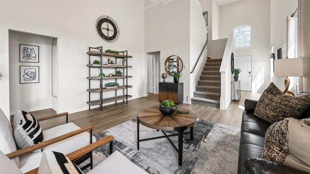 1305 Rusted Rail Drive Princeton, TX 75407 - Photo 29 of 35 a living room with furniture and wooden floor