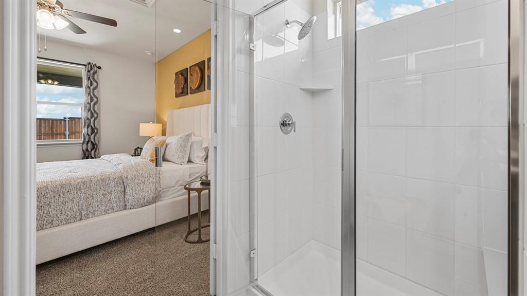 1305 Rusted Rail Drive Princeton, TX 75407 - Photo 7 of 35 a bedroom with a bed and a painting on the wall