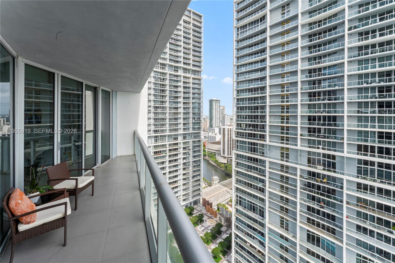 495 Brickell Avenue, Unit 3208 Miami, FL 33131 - Photo 2 of 51 a view of balcony with a couple of chairs