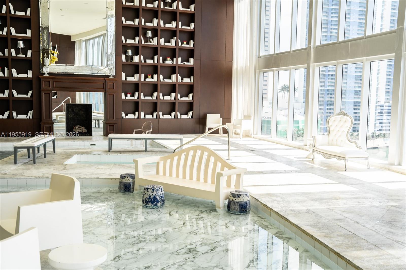 495 Brickell Avenue, Unit 3208 Miami, FL 33131 - Photo 34 of 51 a living room with a couch and a large window